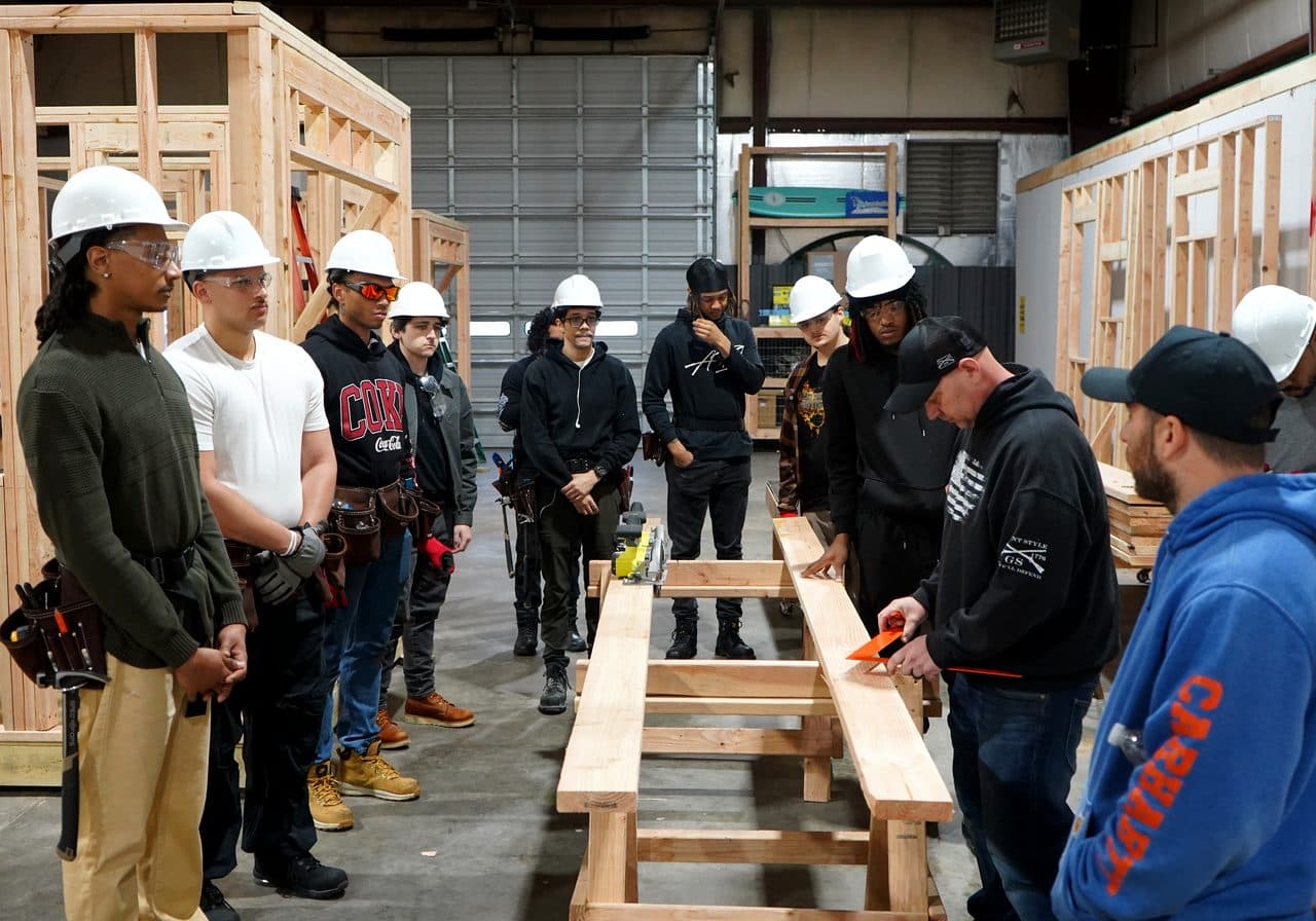 Participants training on a skilled-trades job site
